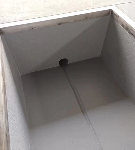 Collection sump for scissor lift installation pits